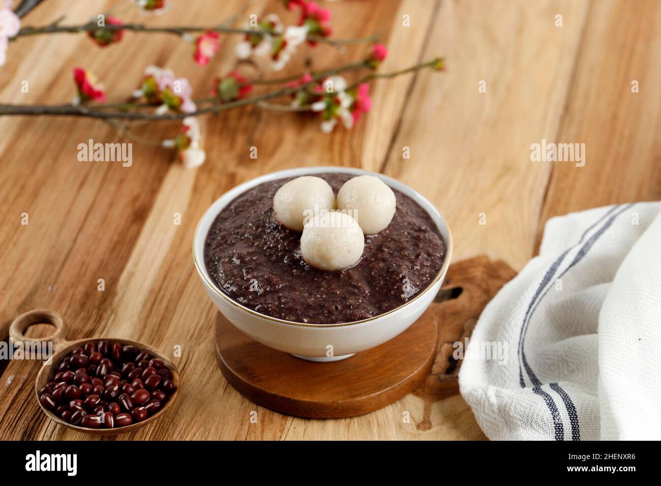 Korean Red Bean Porridge with Rice Cake or Patjuk Dongji. Popular Dish for Family Gathering during New Year Seollal, Dongzhi, Chuseok Stock Photo