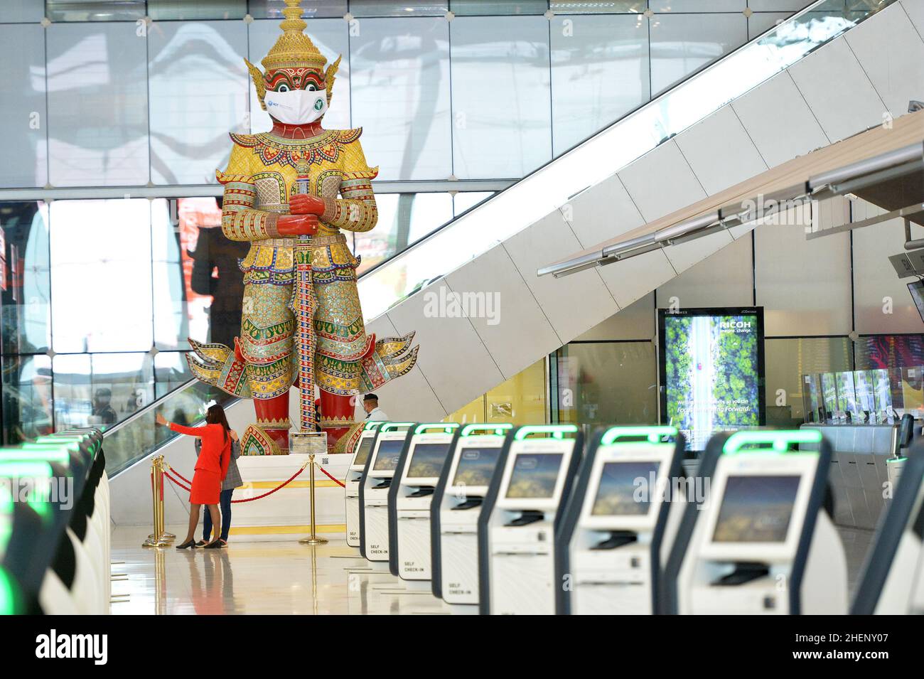 BANGKOK, Jan. 12, 2022 (Xinhua) -- People are seen at the Suvarnabhumi International Airport in Bangkok, Thailand, Jan. 11, 2022. Due to concerns about a new wave of COVID-19 outbreak, Thailand halted the quarantine-free travel scheme from Dec. 22, 2021 and most of its Sandbox Program, which enables quarantine-free entry while requiring visitors to stay in a specific destination for seven days with free movement during their stay, except for the resort island of Phuket. According to the Center for COVID-19 Situation Administration, from Jan. 11 onwards, Thailand will allow quaran Stock Photo
