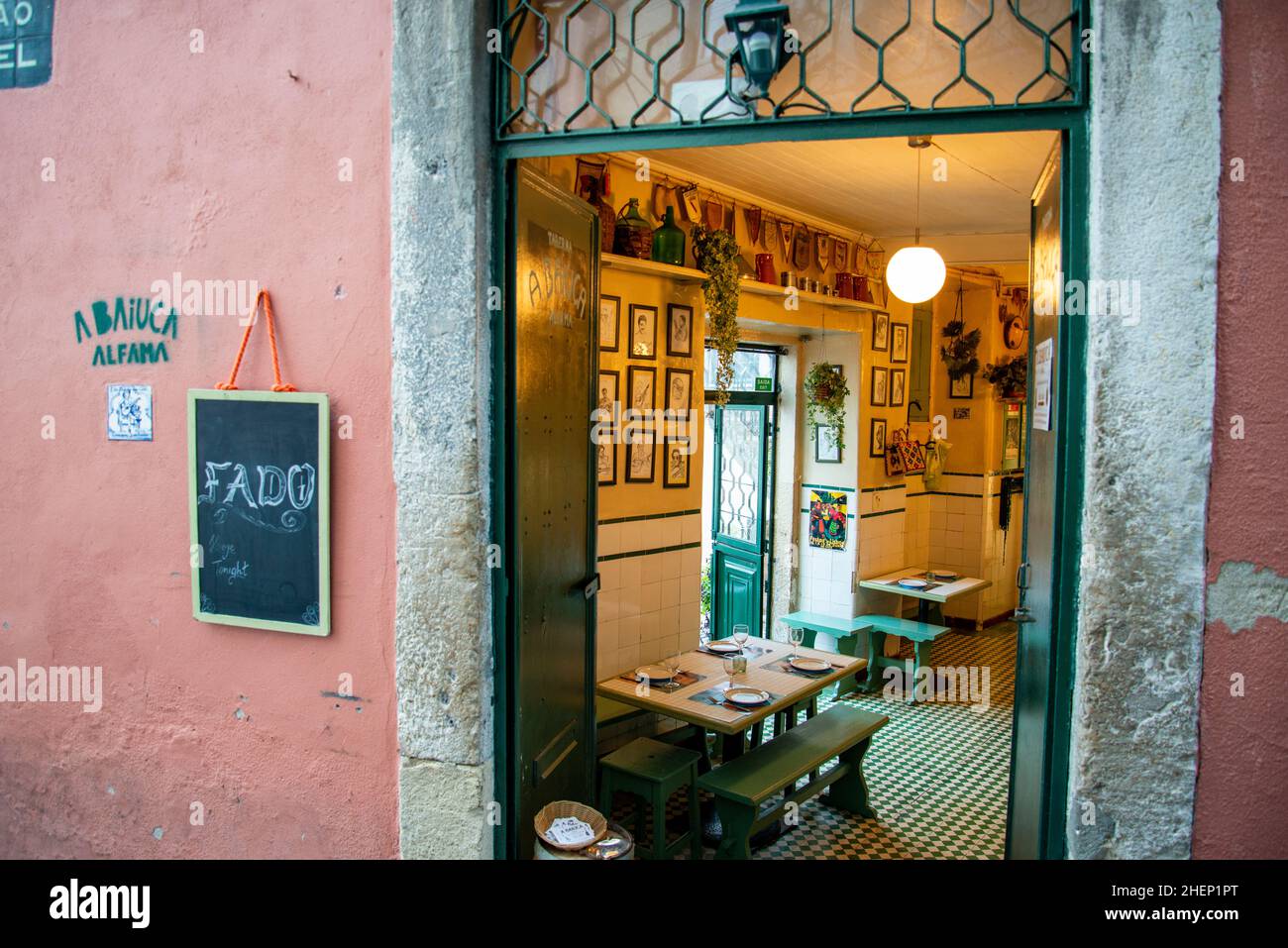 a traditional Fado Music Restaurant in a street and alley in Alfama in the City of Lisbon in Portugal.  Portugal, Lisbon, October, 2021 Stock Photo