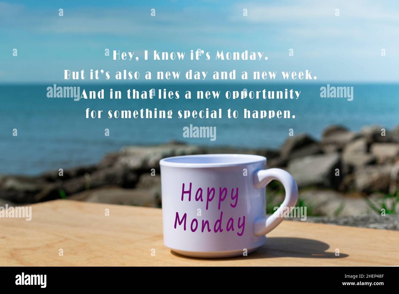 Motivational and Inspirational quote on an empty cup on blurred beach  background. Monday concept Stock Photo - Alamy