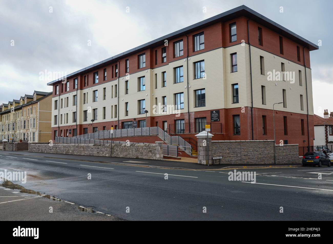 Rhyl, UK. Dec 25, 2021. The Grange is a block of apartments for people over 55 beside the promenade of Rhyl. The building was constructed by Anwyl Par Stock Photo