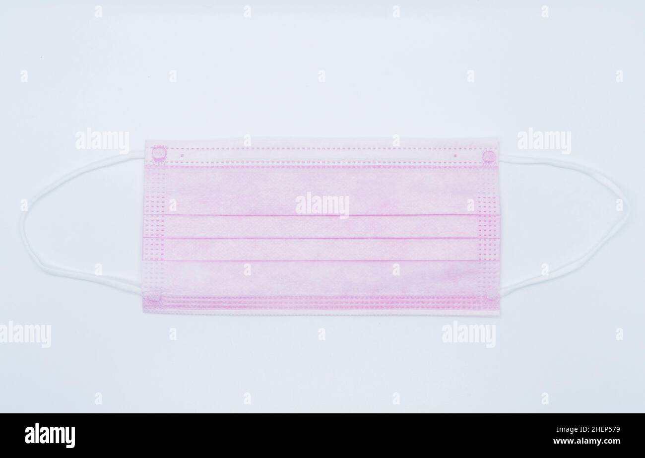 pink face masks isolated on white background Stock Photo Alamy