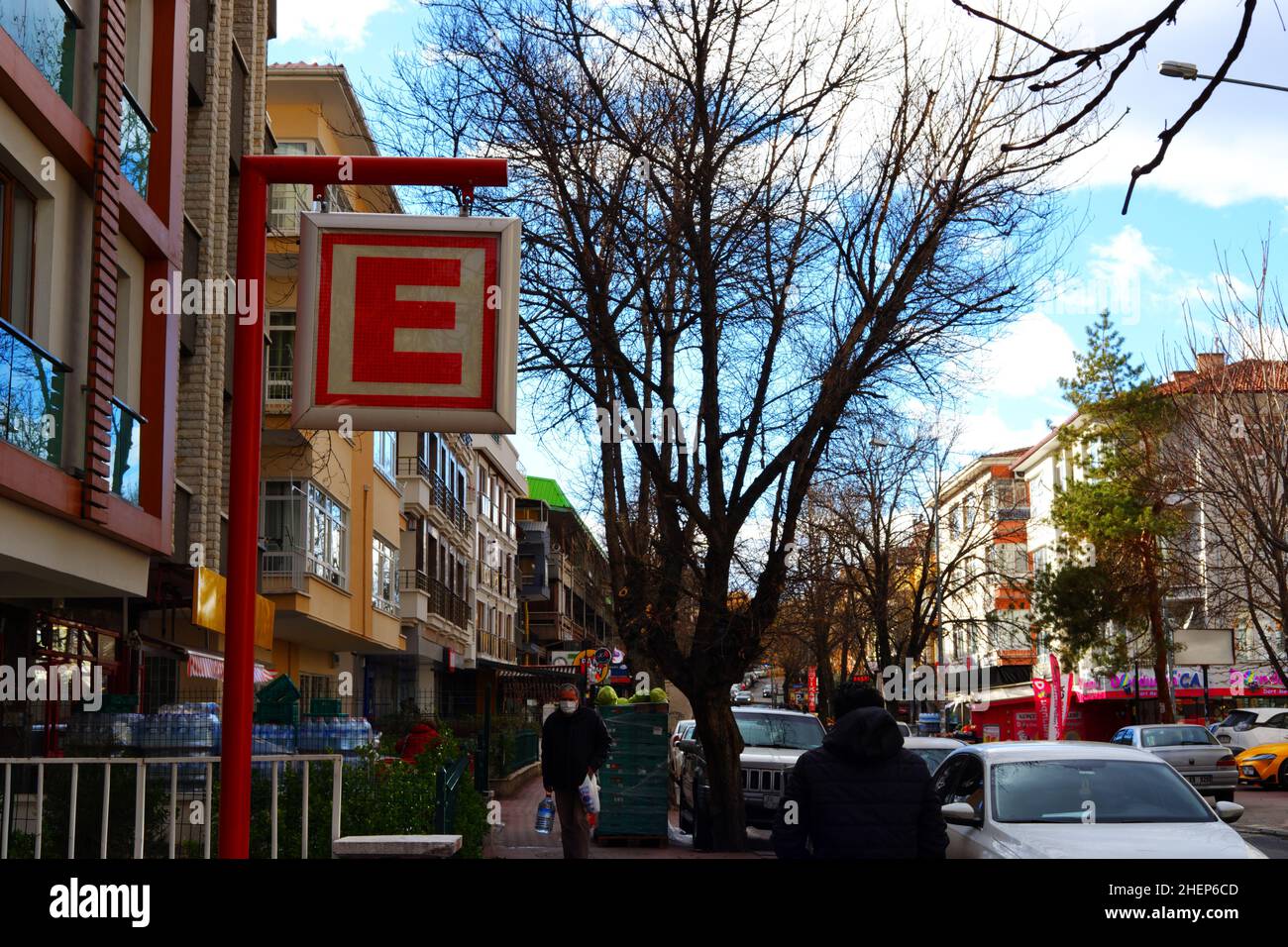 Red letter E of pharmacy signboard at street, pharmacy in Turkish-Eczane- Stock Photo