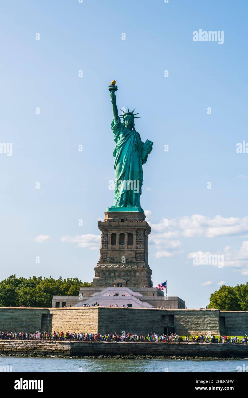 The statue of Liberty  with blue sky background. Stock Photo