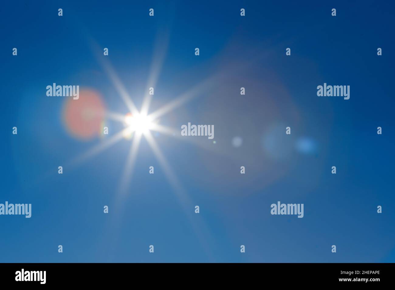 sun on the blue sky Stock Photo