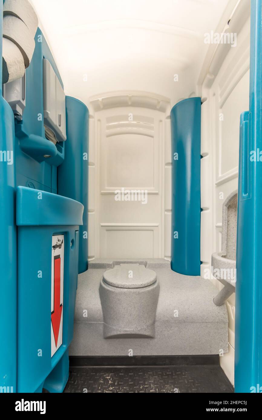 Clean mobile toilet cabin as a sanitary facility on construction sites and festivals Stock Photo