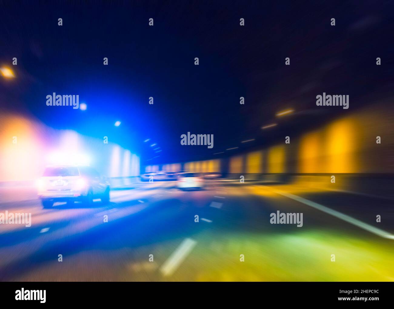police car with lighting while  running in tunnel. Stock Photo