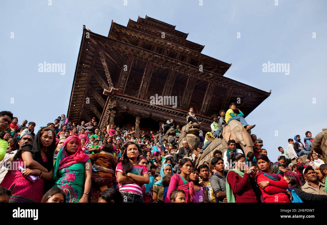 Nyatapola Temple in Bhaktapur crowded with locals celebrating the Newari New  Year festival of Bisket Jatra. Stock Photo