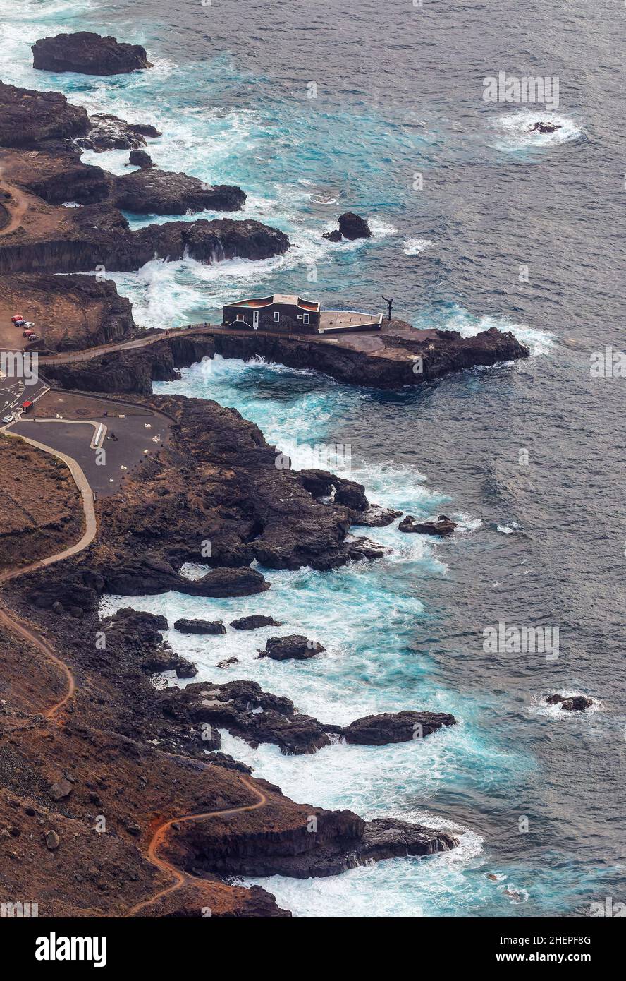 Coastline near Las Puntas, El Hierro (Canary Islands) with historical building Punta Grande Stock Photo