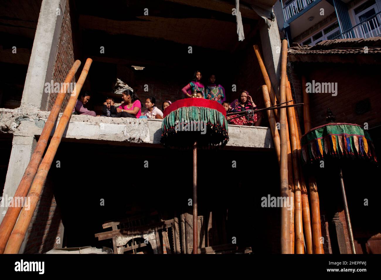 Everyday street scene on the morning of Sindoor Jatra in the UNESCO World Heritage city of Bhaktapur, Nepal. Stock Photo