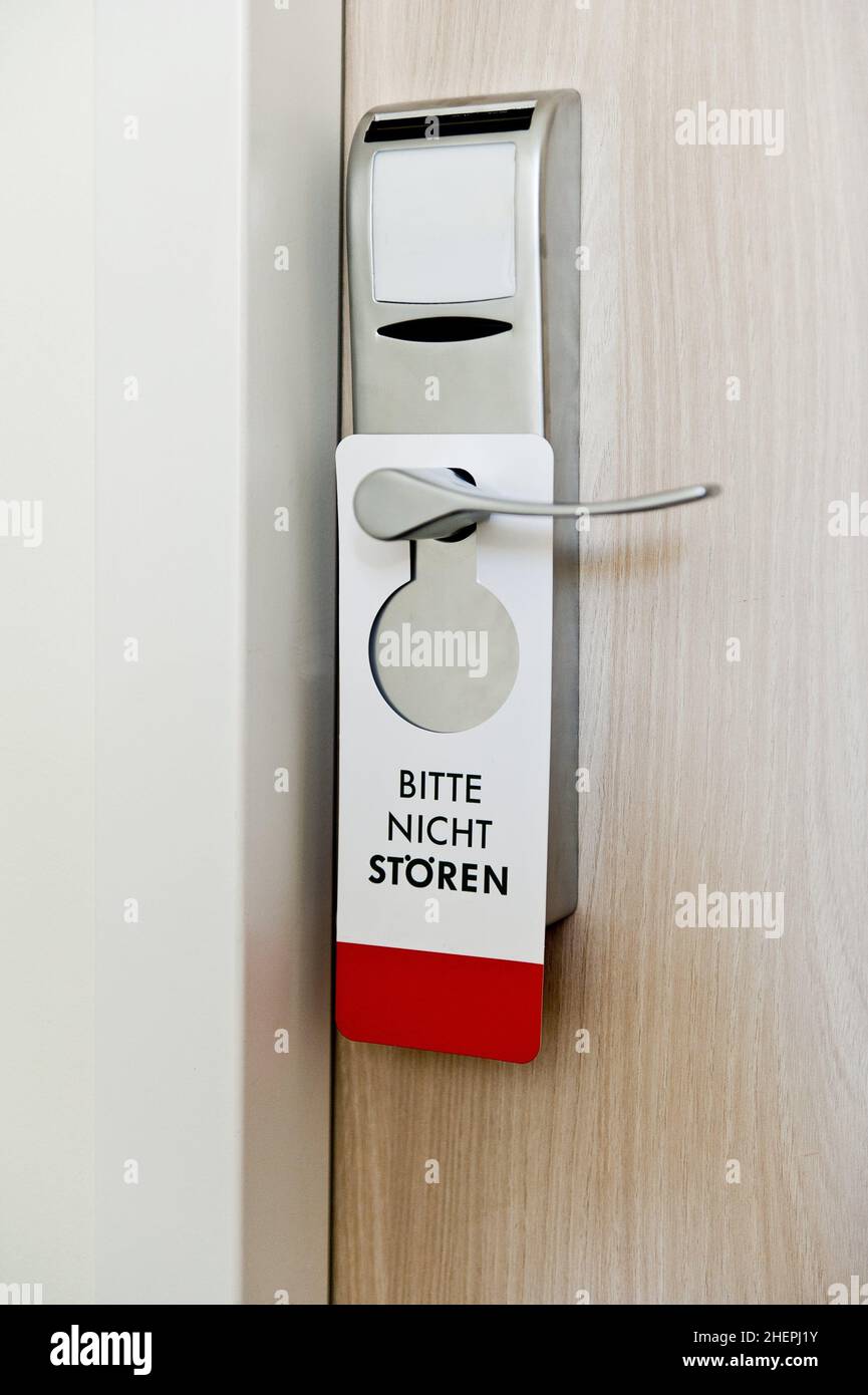 Bitte nicht stoeren sign at a hotel room door , Germany Stock Photo