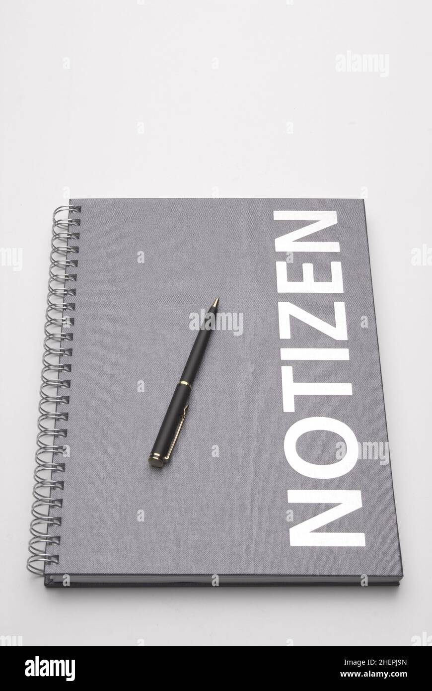 Note-book with a biro Stock Photo