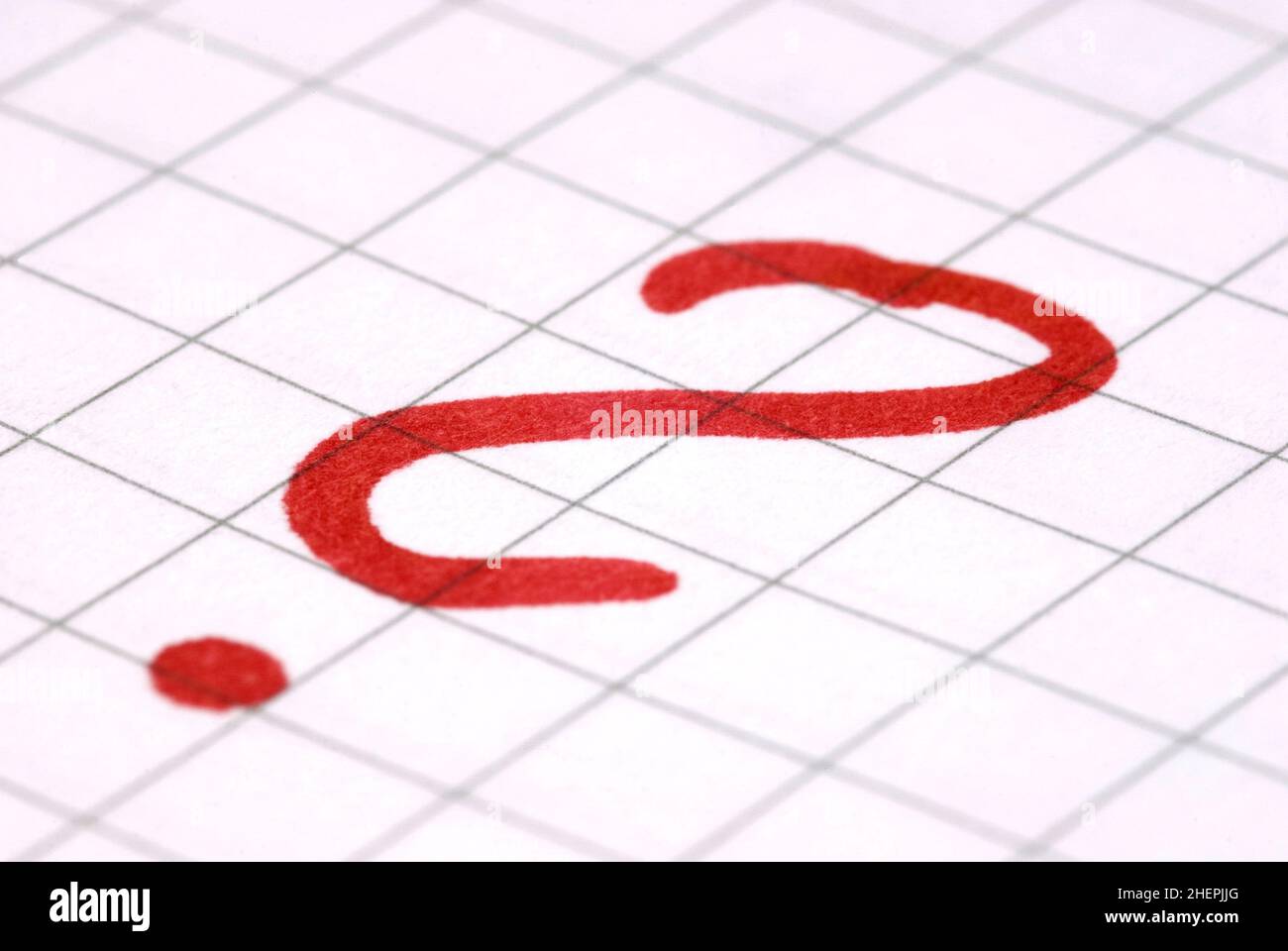 red question mark on a paper sheet Stock Photo