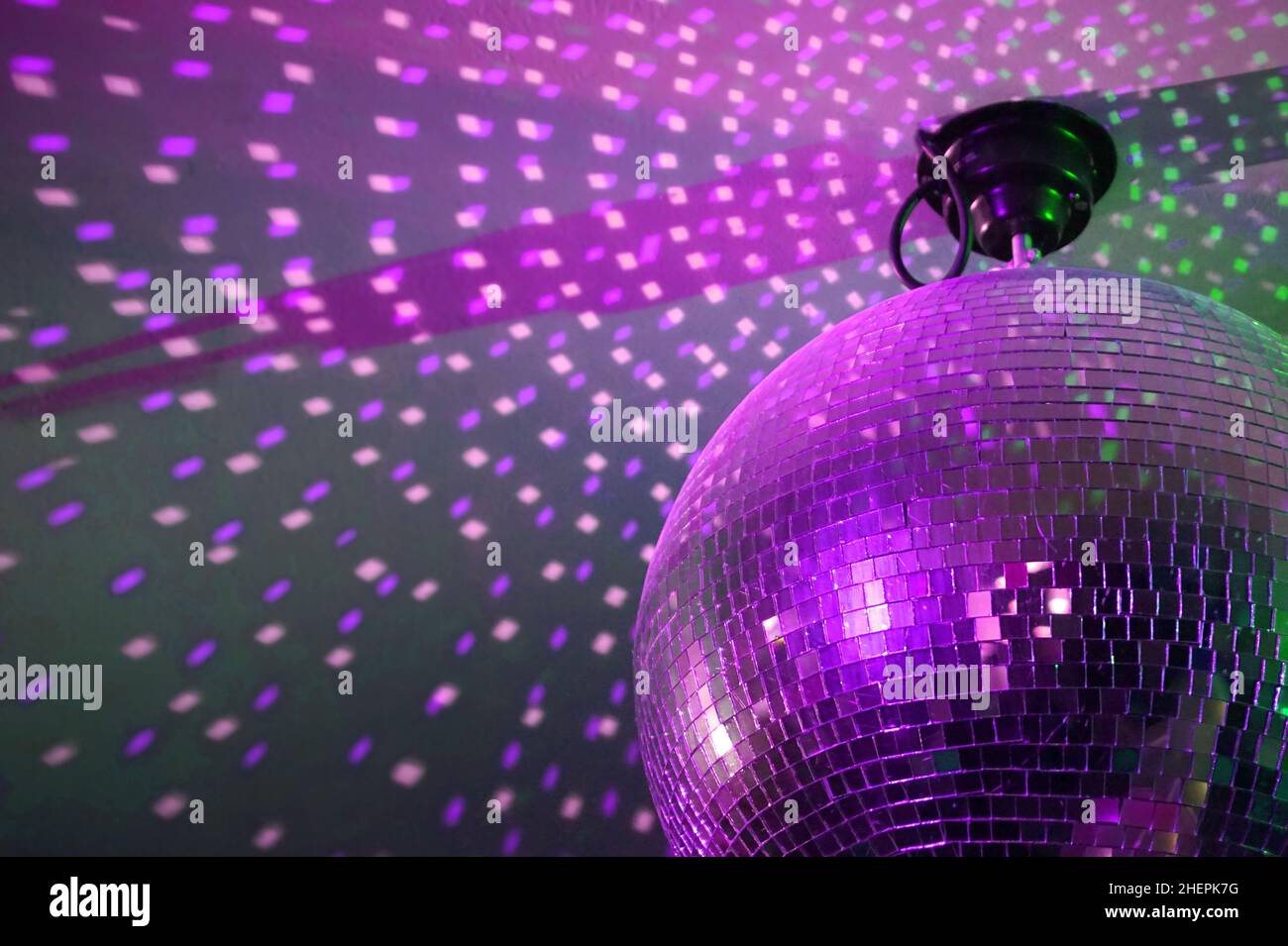 Round disco ball, light reflections on a ceiling Stock Photo - Alamy