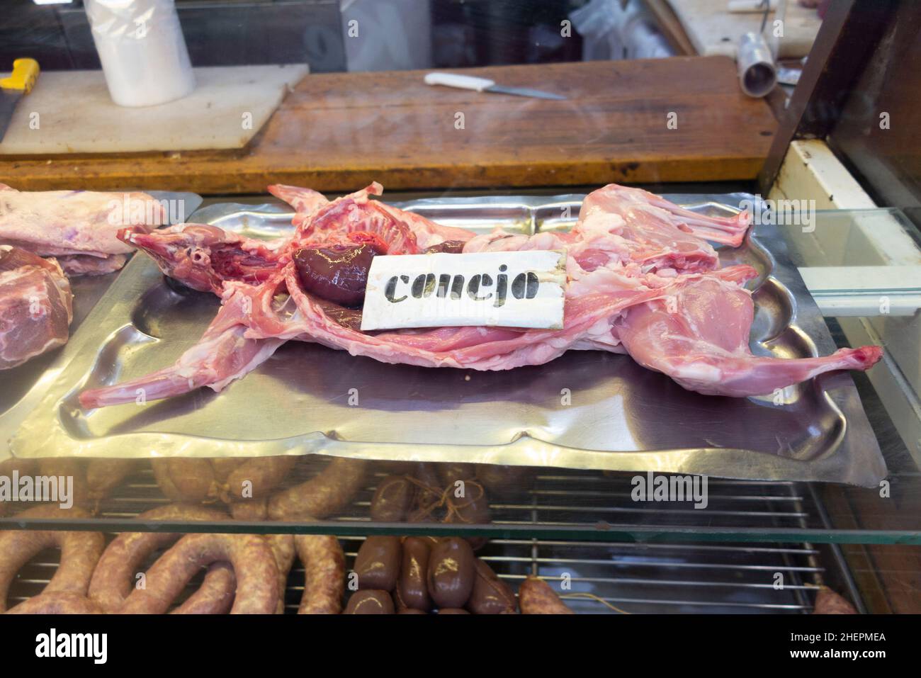 rabbit at a butchers ahop mith the spanish word for rabbit, Conejo