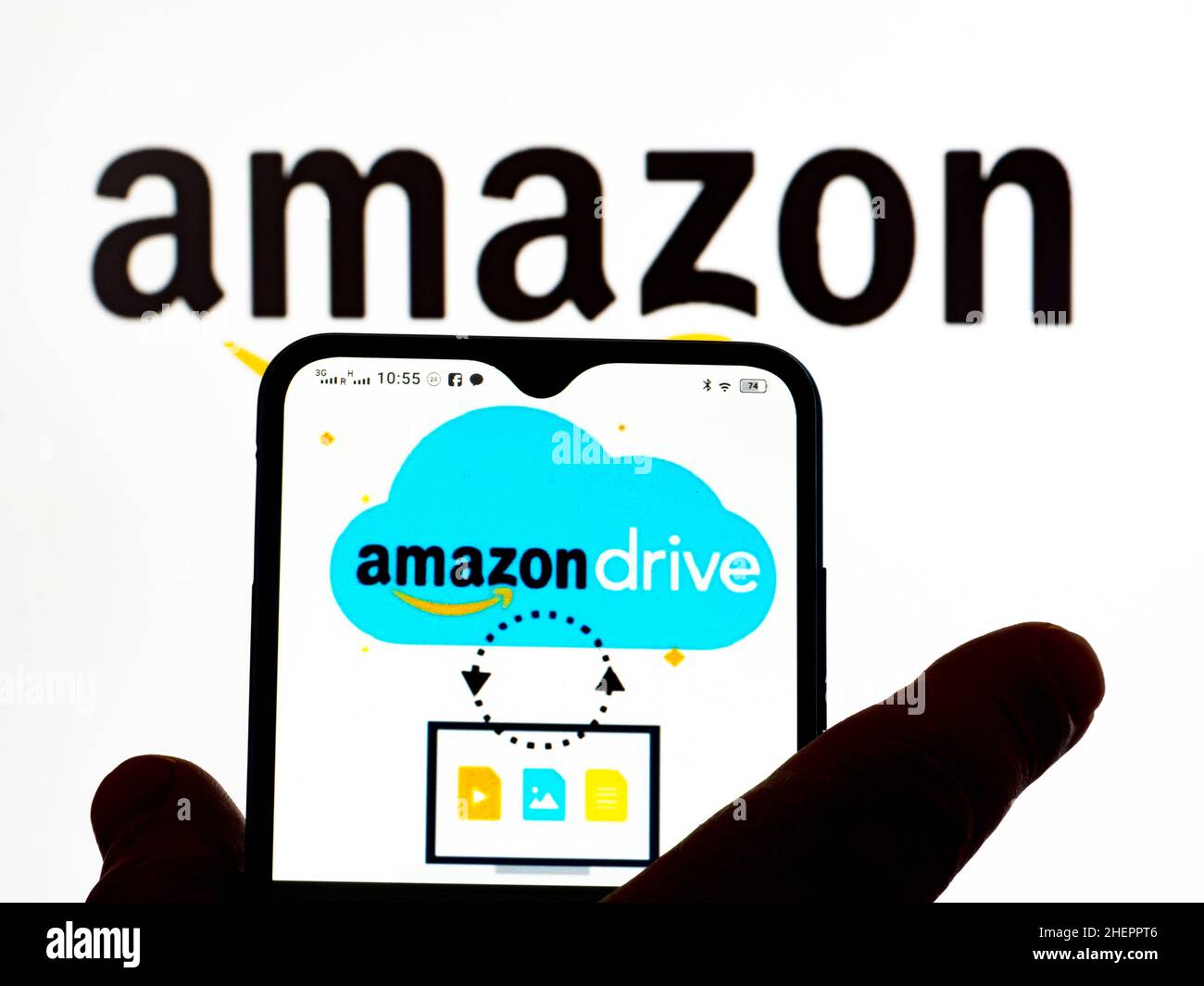 In this photo illustration, the Amazon Drive logo is seen displayed on ...