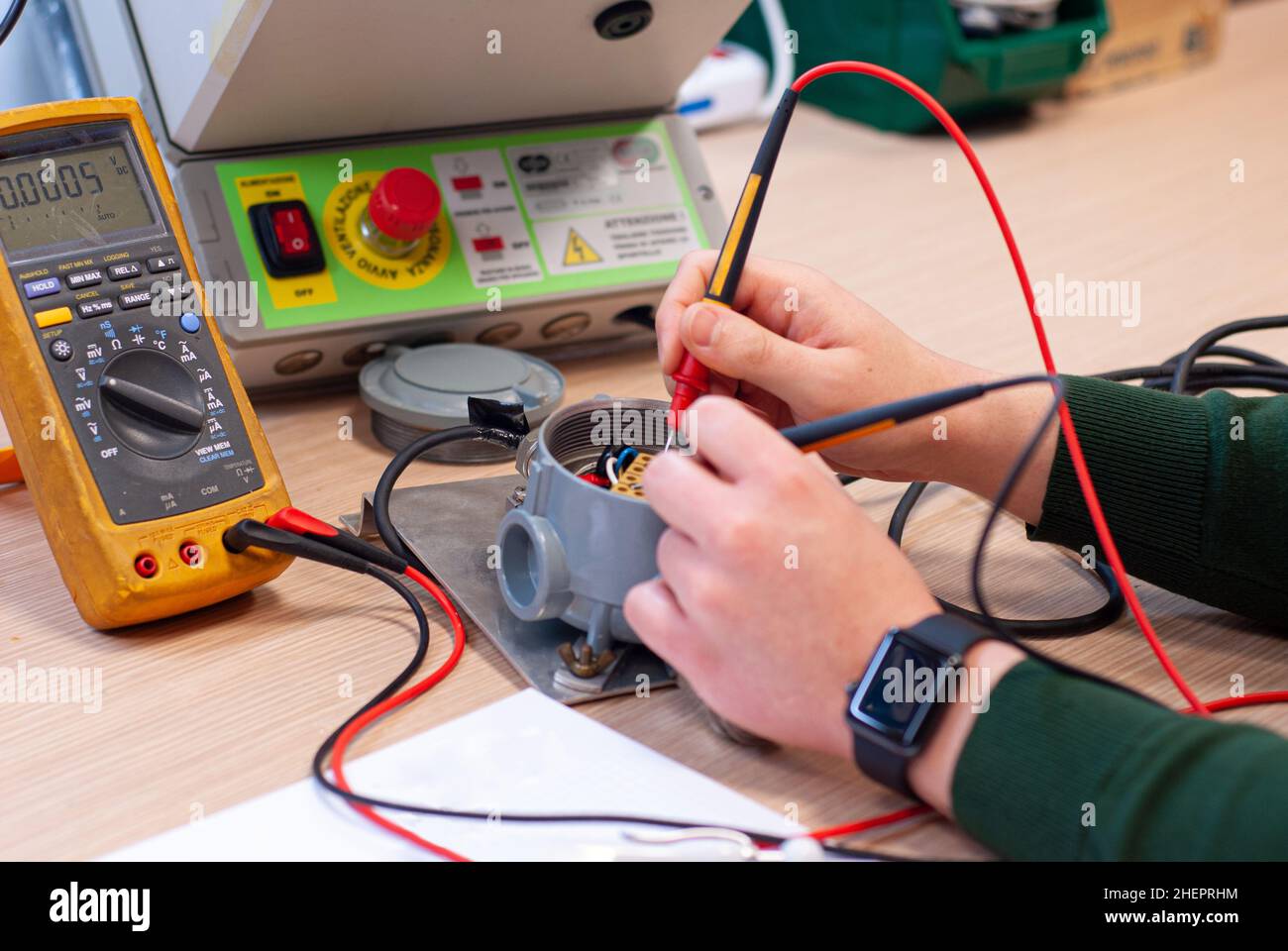 Man on work in electronic laboratory, for check on parts with instruments Stock Photo