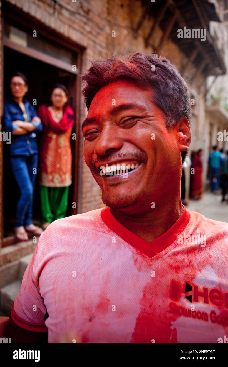 A face in the crowd during Sindoor Jatra (Vermillion Festival) - part of Nepali New Year (Bisket Jatra) in Bhaktapur. Stock Photo