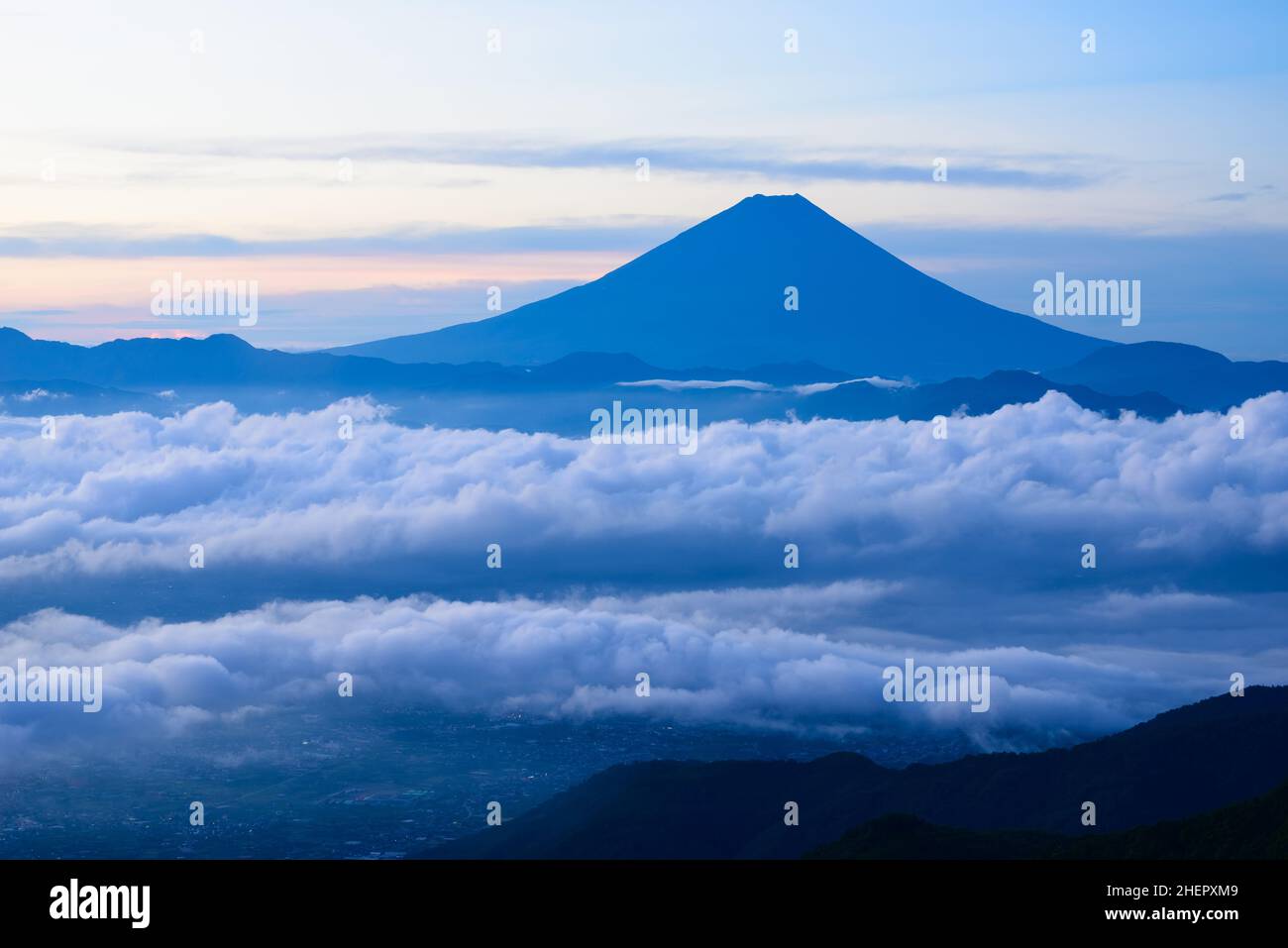 Mount Fuji Seen Through The Sea Of Clouds Stock Photo