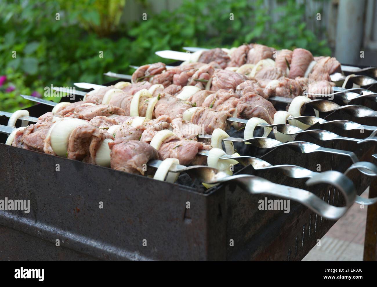 Shashlik or shashlyk (meaning skewered meat) was originally made of lamb.  Nowadays it is also made of pork or beef depending on local preferences and  Stock Photo - Alamy