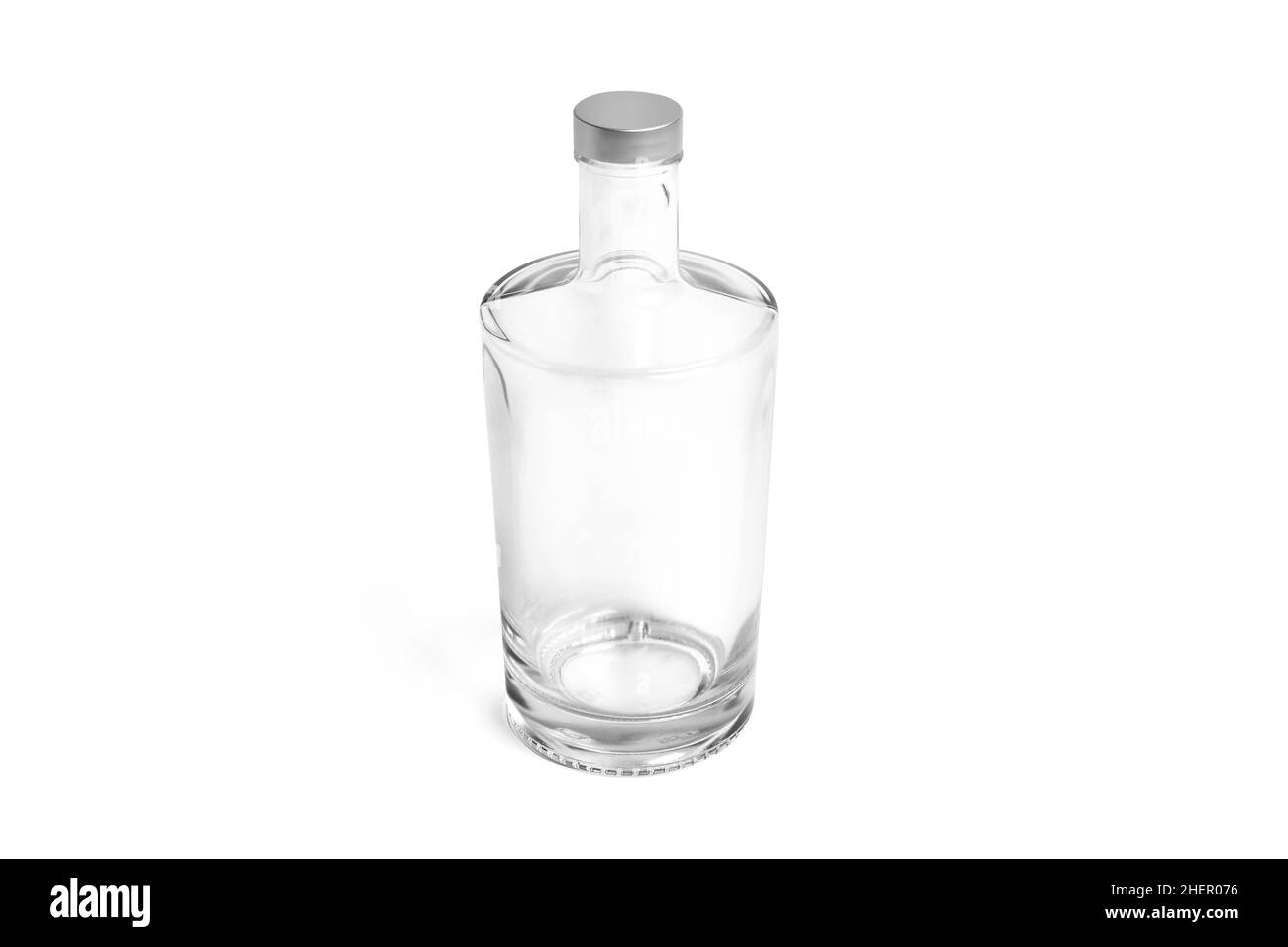 Empty glass carafe isolated on white background. Bottle side view with transparent liquid. Pitcher and glass cup with natural water. Empty jug or Stock Photo