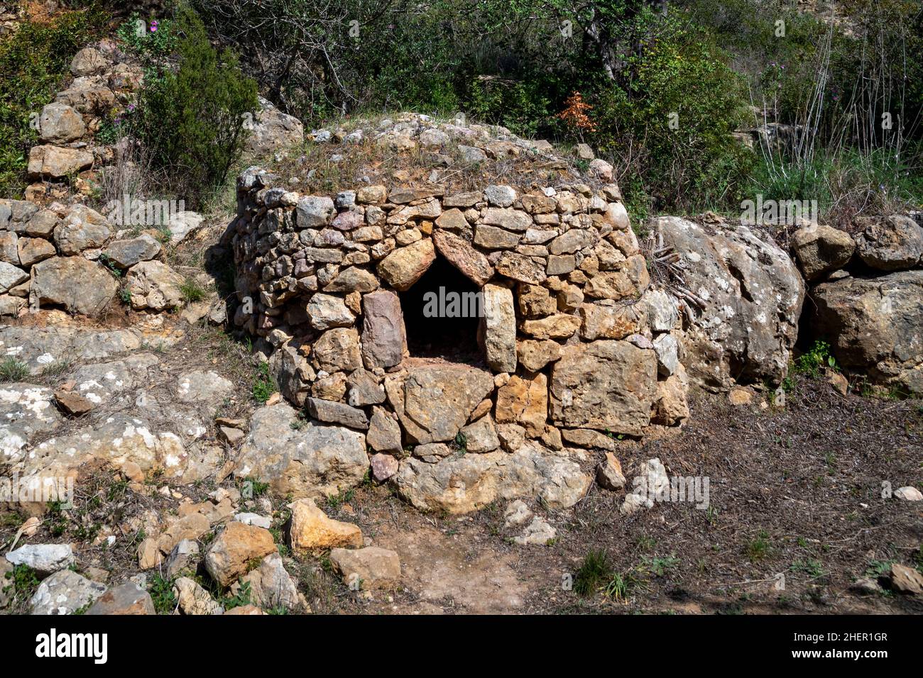 old stone bread oven in the valley of Paderne, Algarve, Portugal Stock Photo