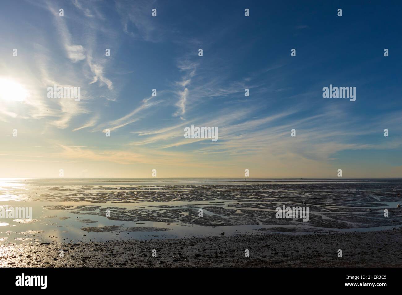 Estuary into the sea during low tide hi-res stock photography and ...