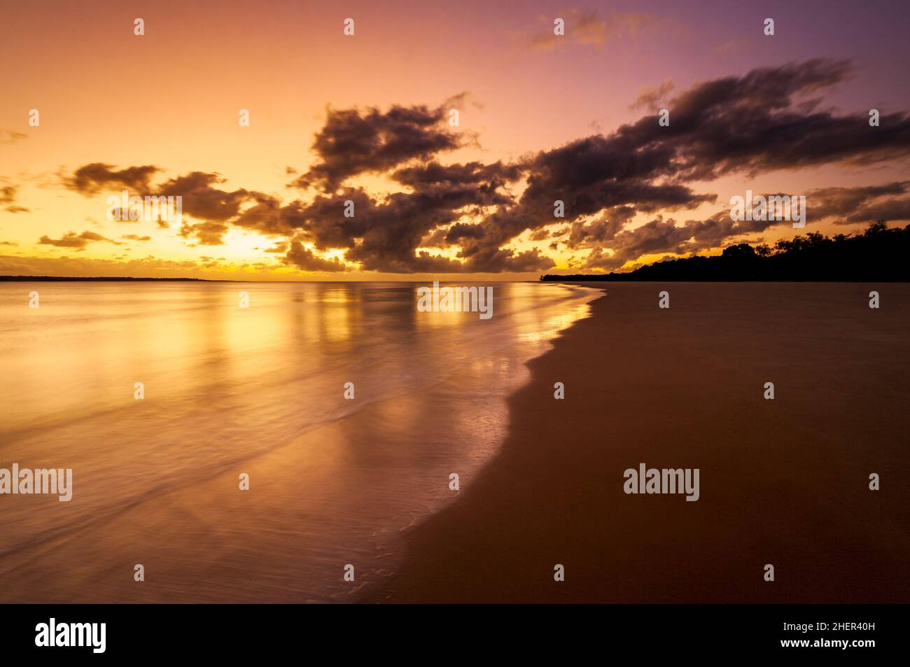 Colourful sunrise on the beach at Inskip Point. Stock Photo