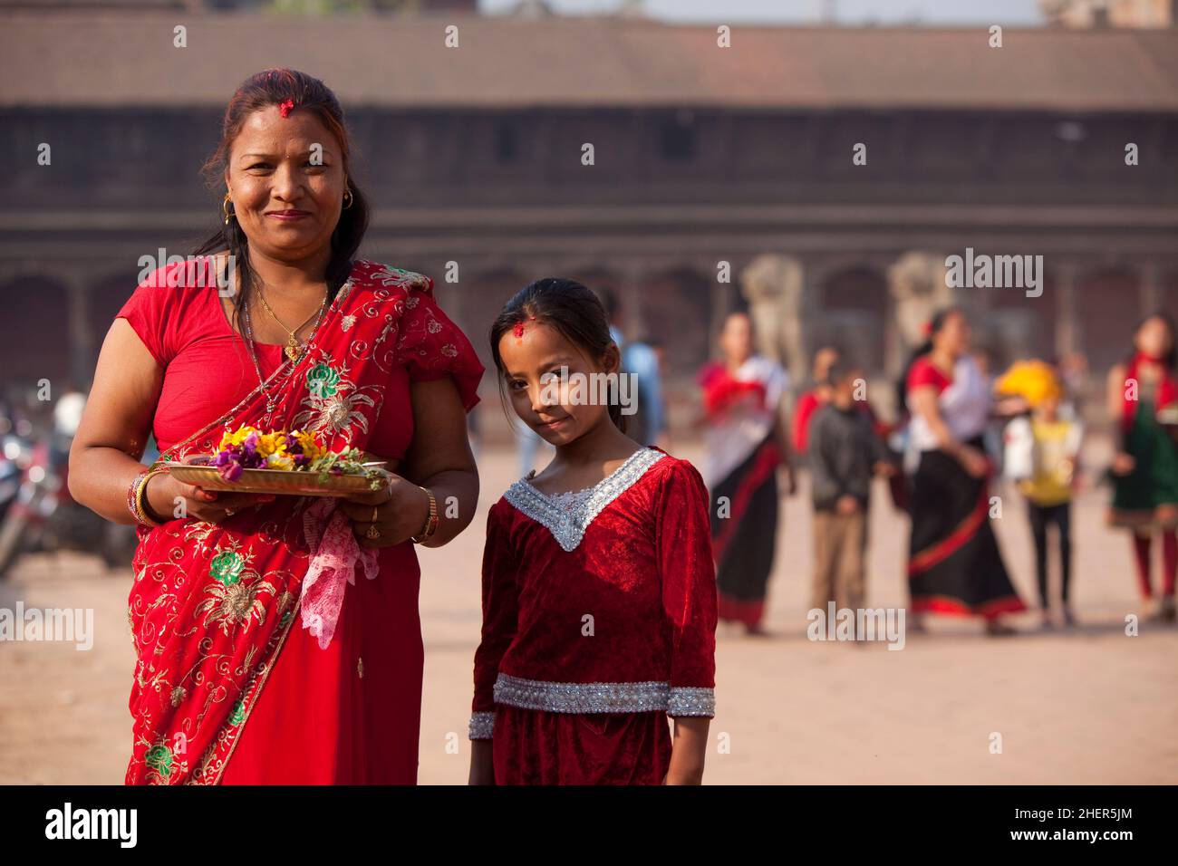 Portrait of Newari woman during Taa Din, part of Nepali New Year (Bisket Jatra) in the UNESCO World Heritage city of Bhaktapur. Stock Photo