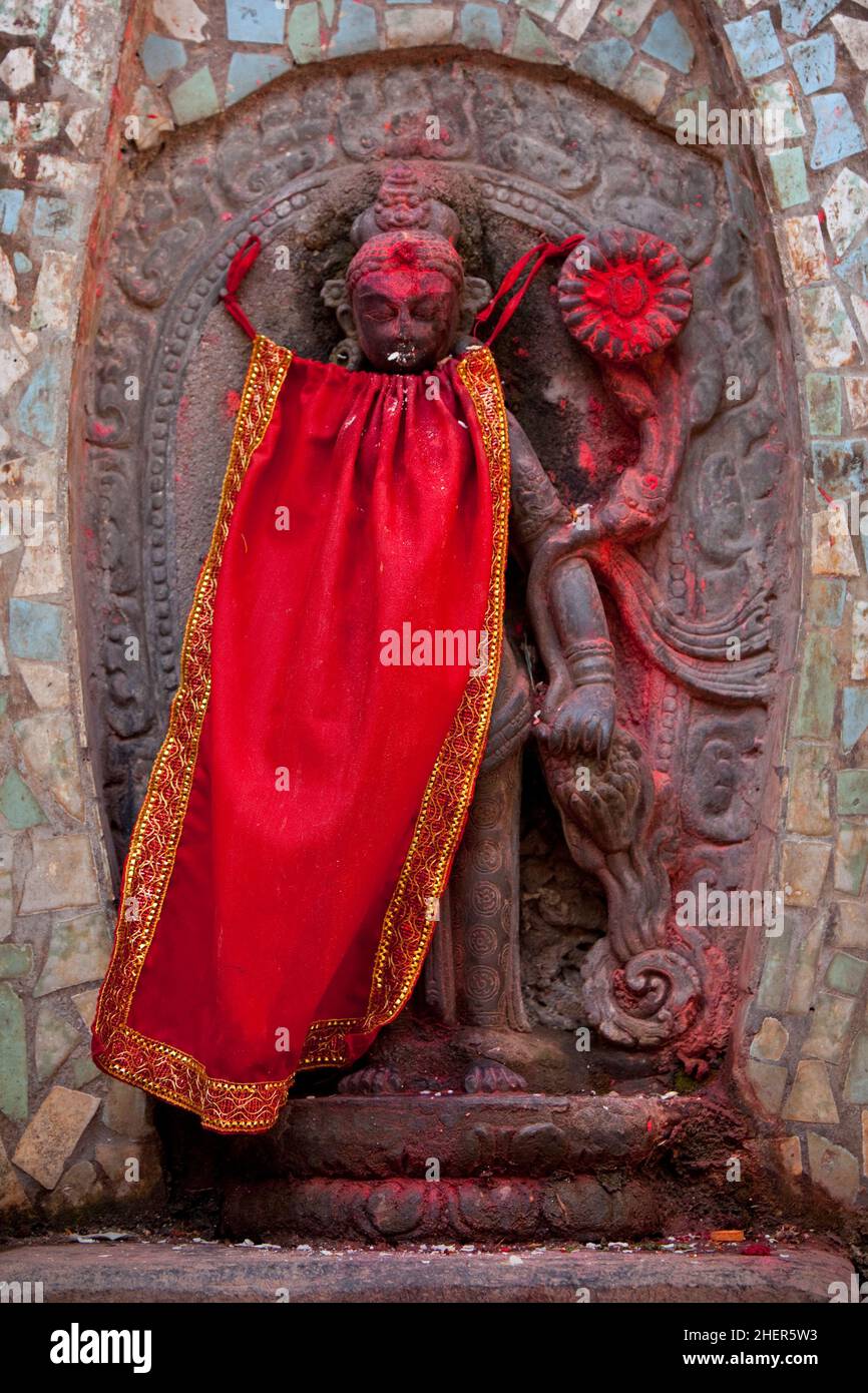 Hindu shrine smeared in scarlet during Nepali New Year (Bisket Jatra) festivities in Bhaktapur. Stock Photo