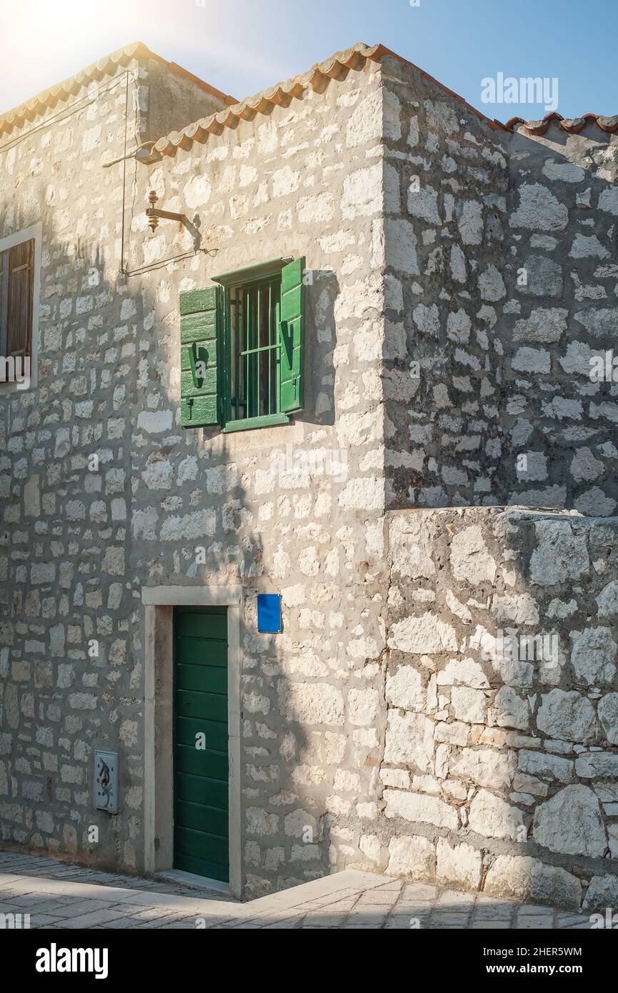 Facade of a stone house at coastal old town. Rovinj, Istria, Croatia Stock Photo