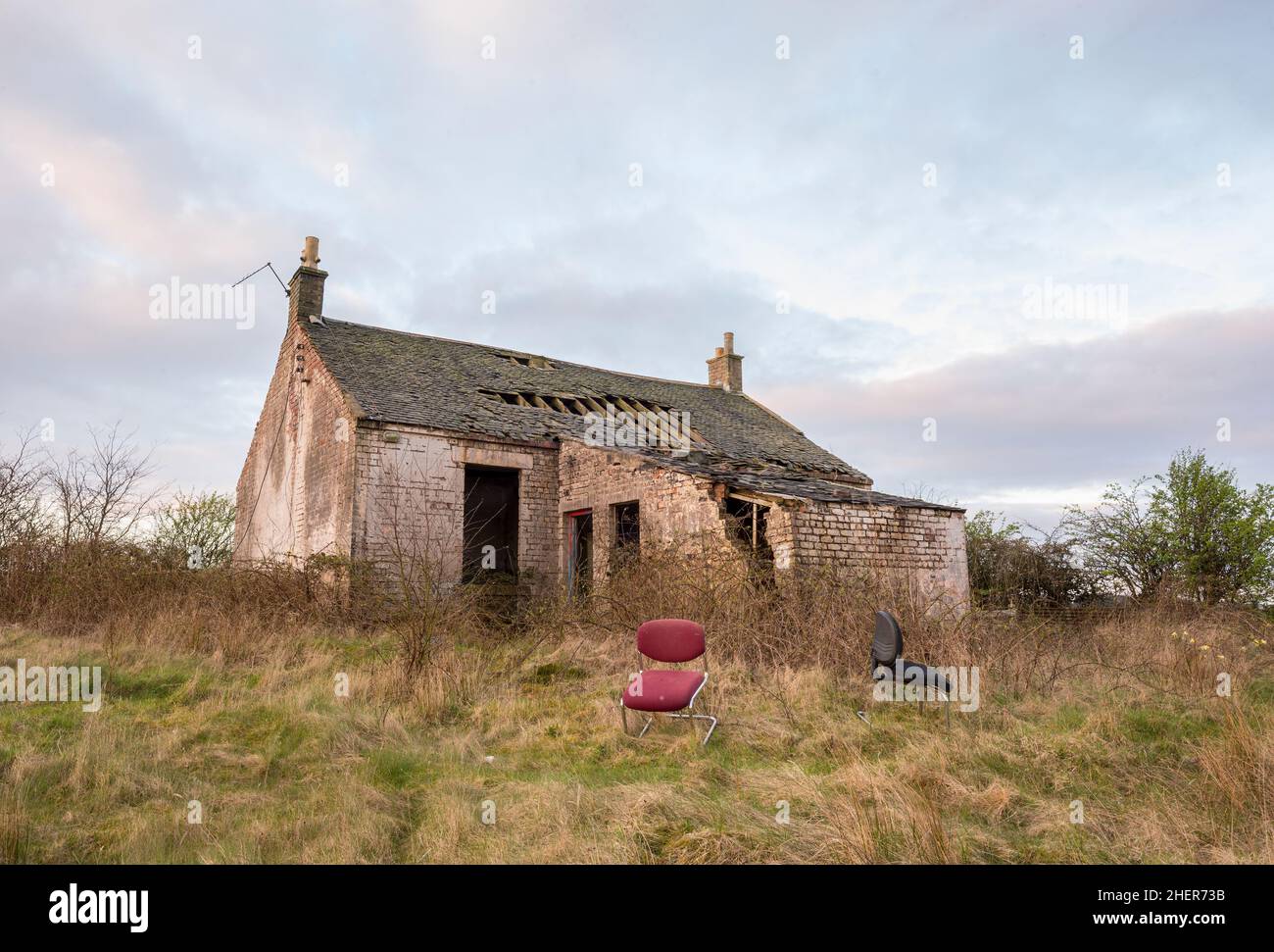 Remote derelict abndoned cottage in rural setting in Scotland. Stock Photo