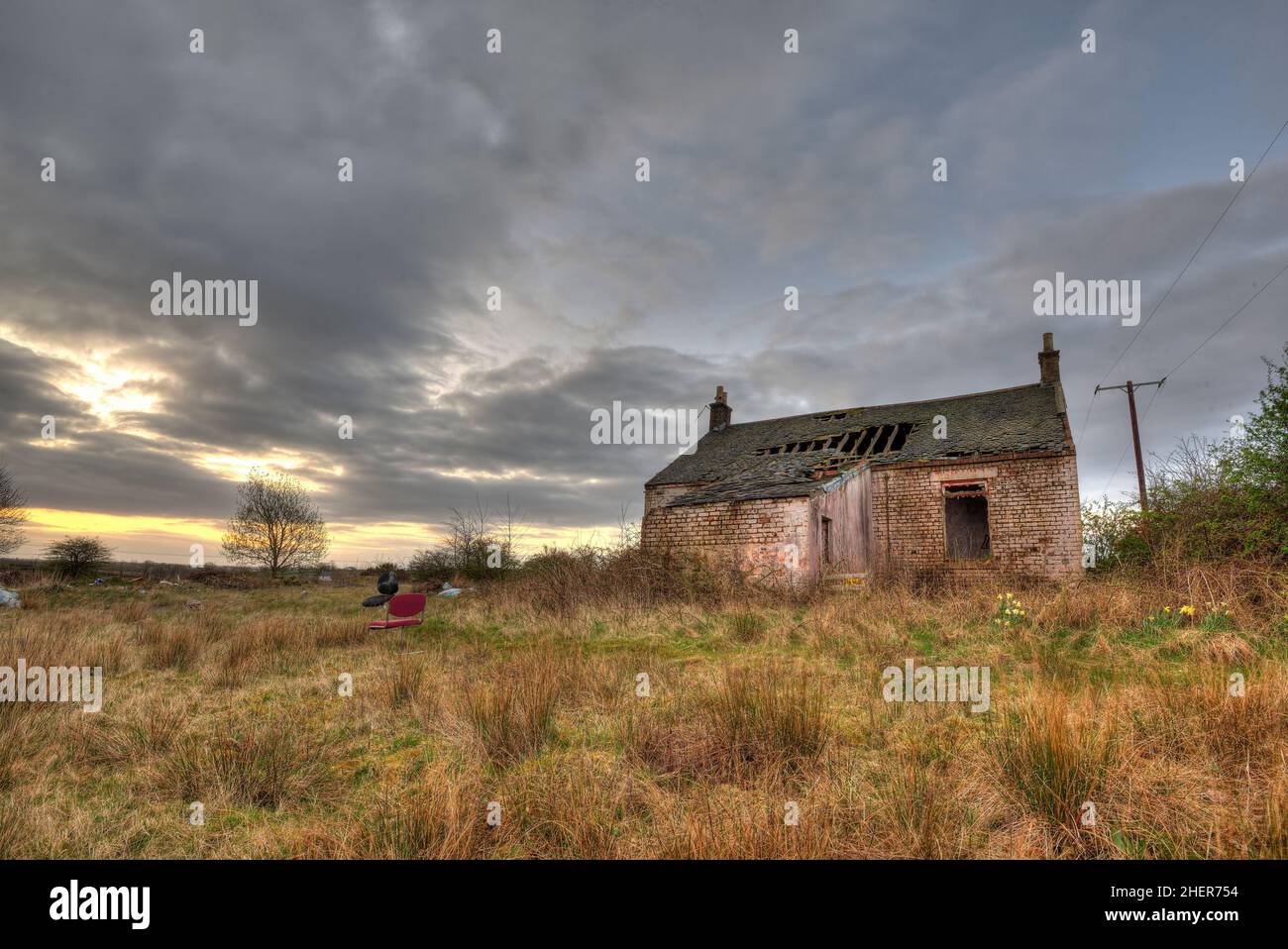 Remote derelict abndoned cottage in rural setting in Scotland. Stock Photo