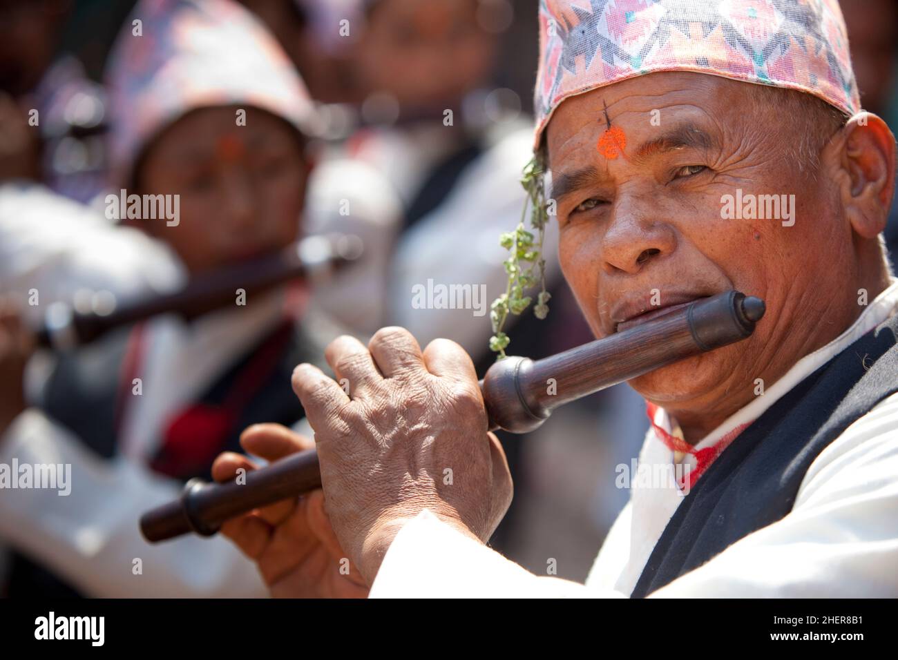 Flautists performing during Taa Din, part of Nepali New Year (Bisket Jatra) in the UNESCO World Heritage city of Bhaktapur. Stock Photo