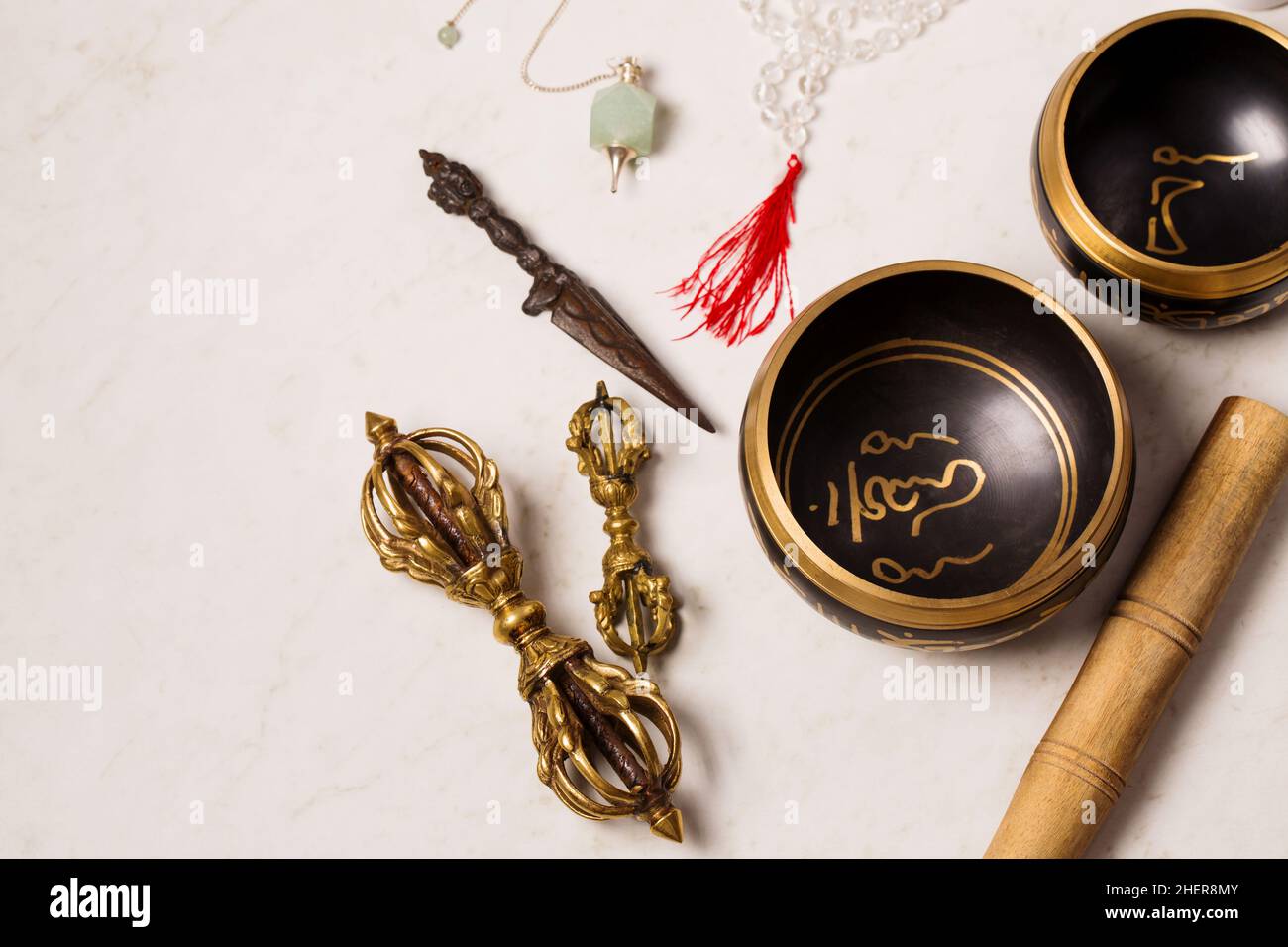 Pendulum, singing bowls and other healing tools for healing in Reiki ...