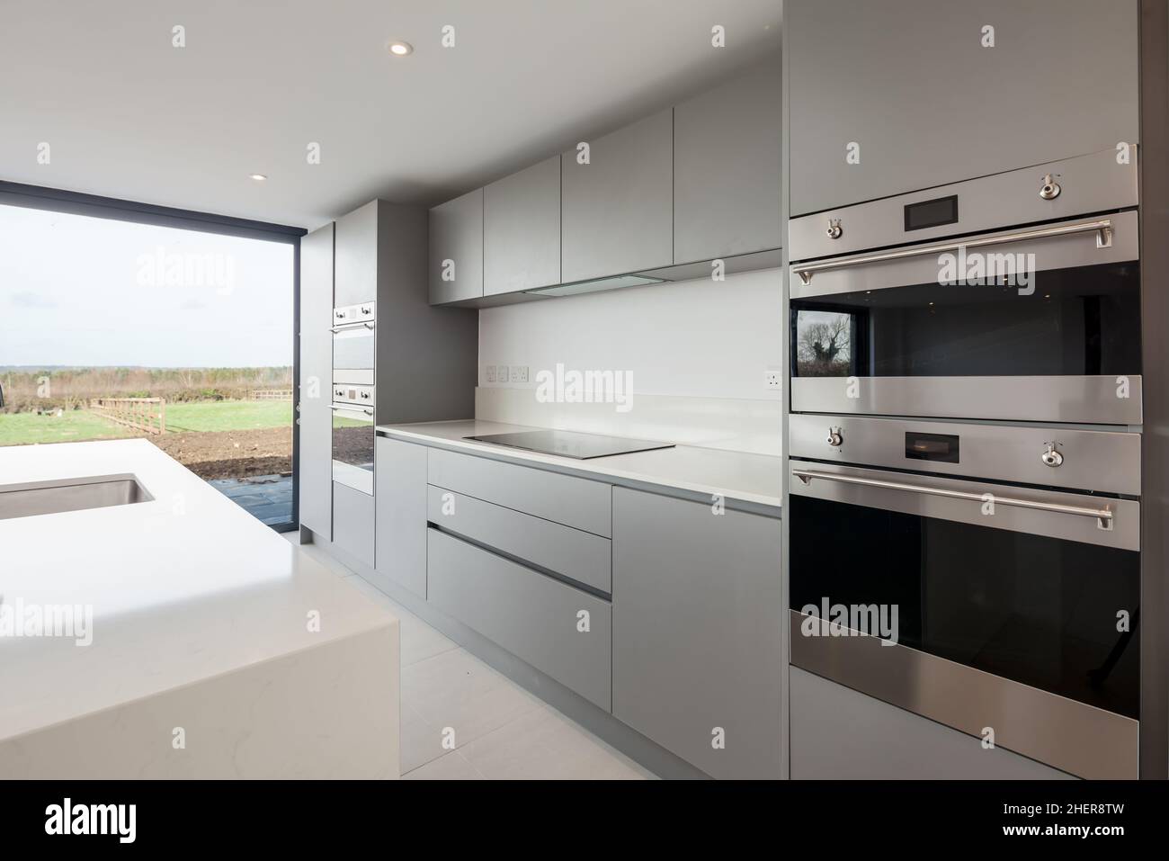 Cowlinge, Suffolk, England - 28 March 2019: Minimalist grey fronted ...
