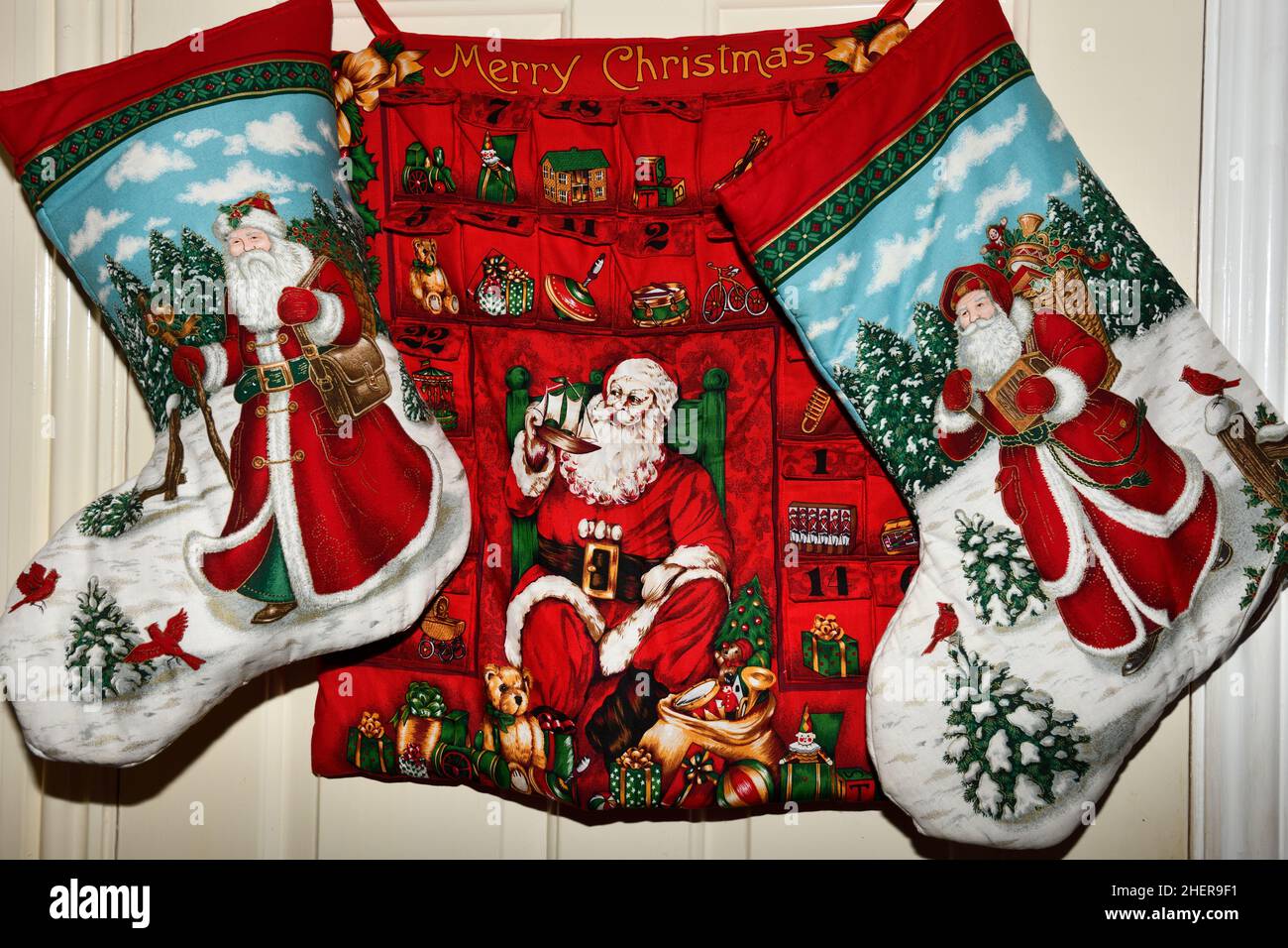 Christmas Time, Advent Calendar and Boots hanging on Door Hook Norton Oxfordshire England uk Stock Photo