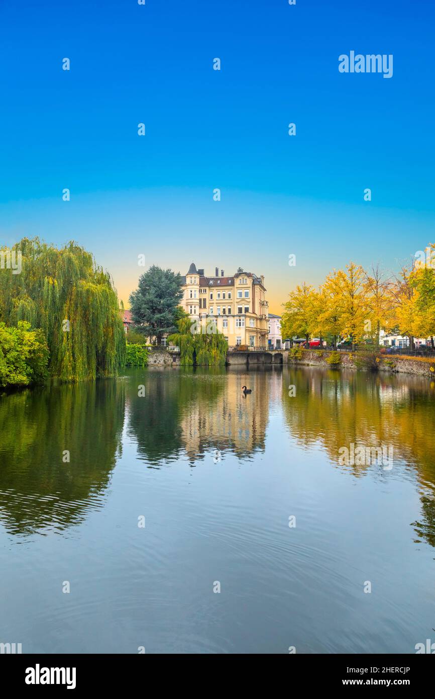 detmold castle with canal and water reflection, Germany Stock Photo