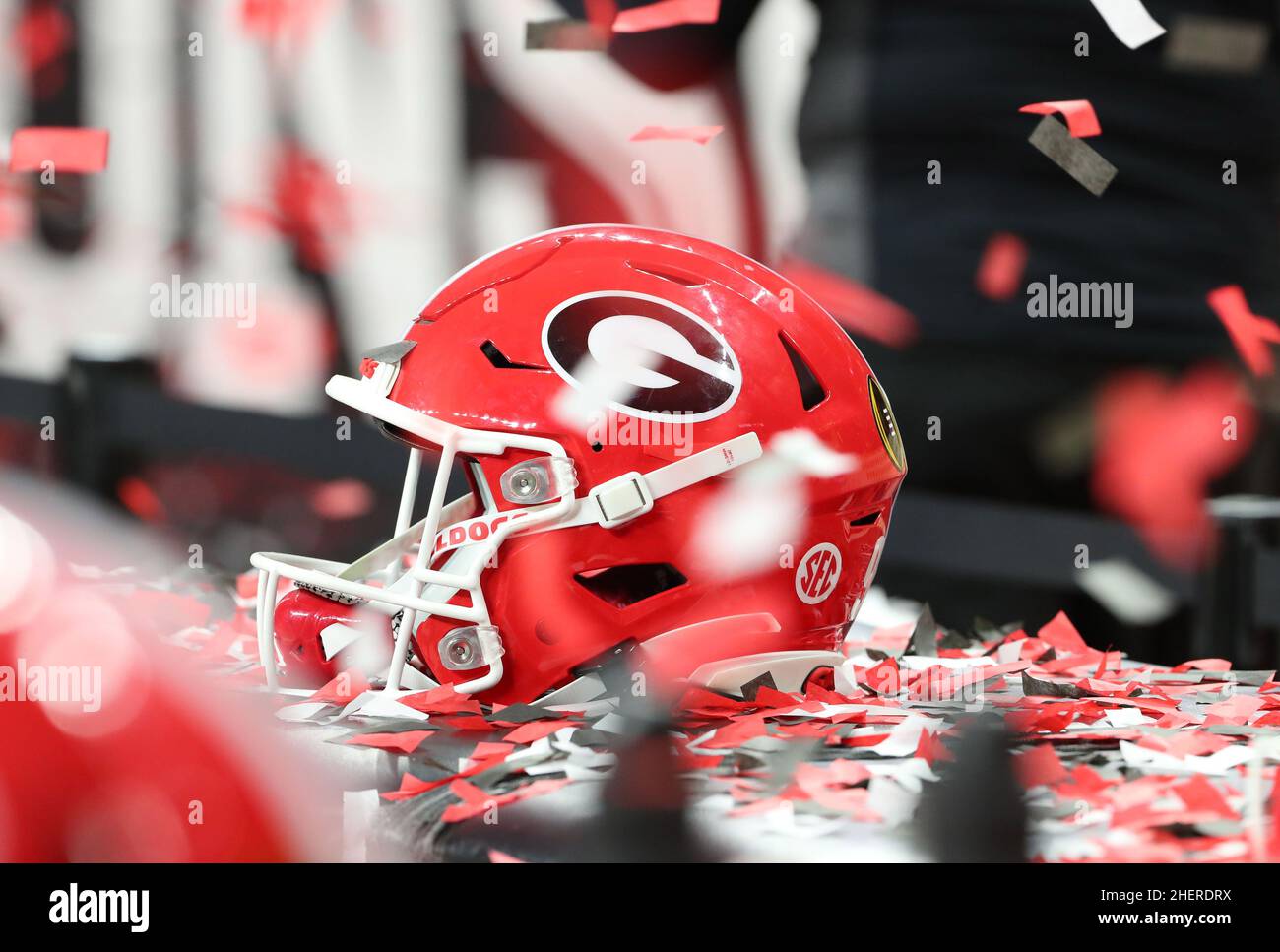 A Bulldogs helmet with confetti after the 2022 CFP college