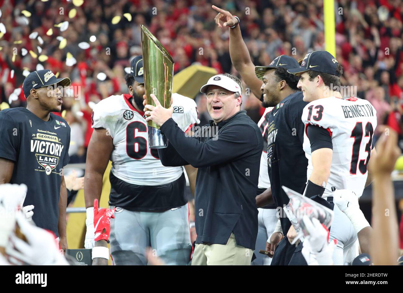 Bulldogs head coach Kirby Smart celebrates during the trophy