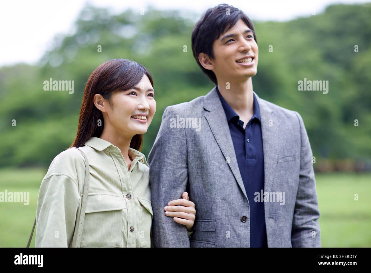 Japanese Couple Taking A Walk In The Park Stock Photo - Alamy
