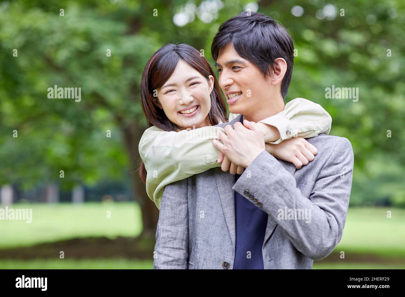 Cuddling Japanese Couple Stock Photo Alamy