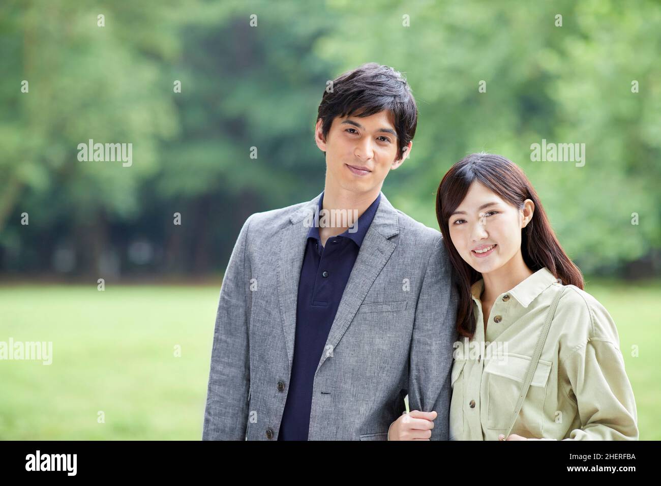 Japanese Couple Taking A Walk In The Park Stock Photo - Alamy