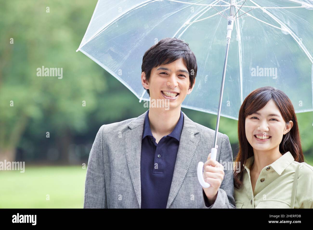 Japanese Couple Taking A Walk In The Park Stock Photo - Alamy