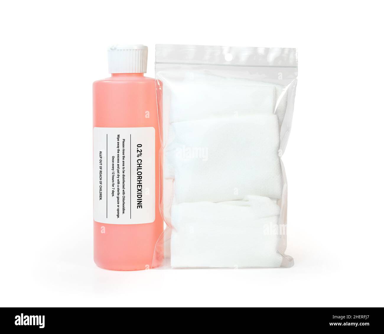 Bottle of disinfectant with bag of gauze. Fake label. Diluted chlorhexidine used in veterinary medicine and for humans as general purpose cleanser for Stock Photo