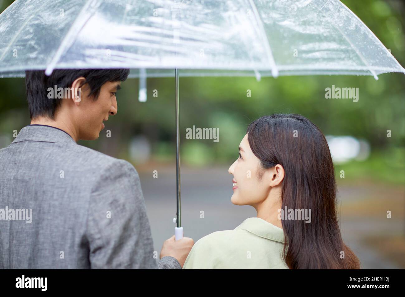 Japanese Couple Taking A Walk In The Park Stock Photo - Alamy