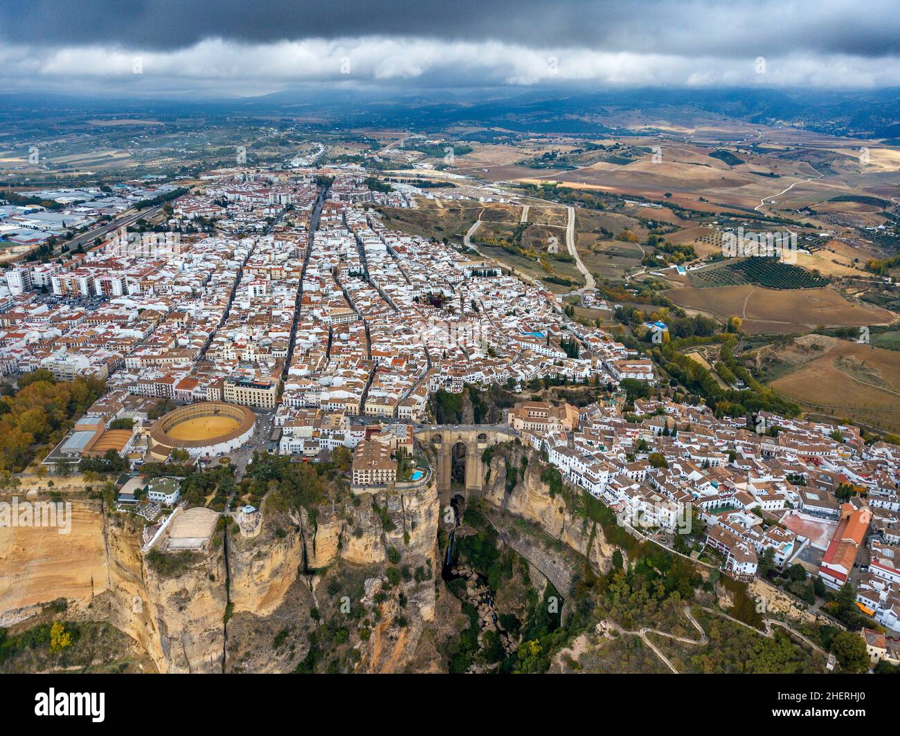 Aerial view of white houses from Puente Nuevo bullring and El Tajo Gorge, Ronda, Andalucia, Spain Stock Photo