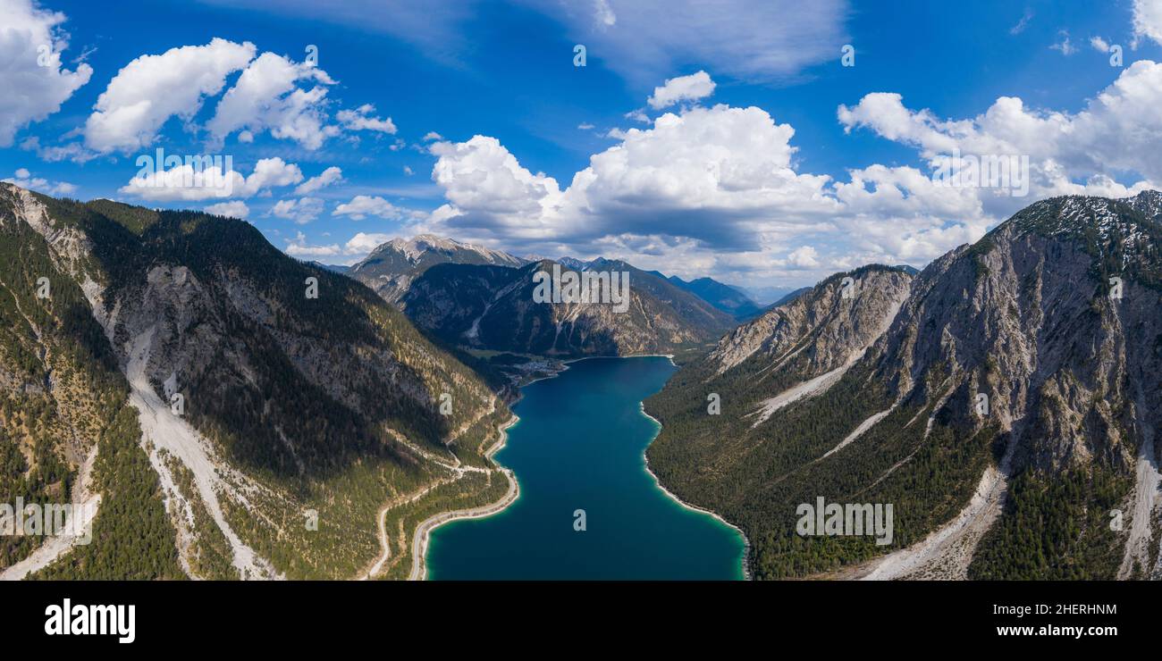aerial view to blue lake plansee panorama at spring surrounded from tirol mountain alps Stock Photo