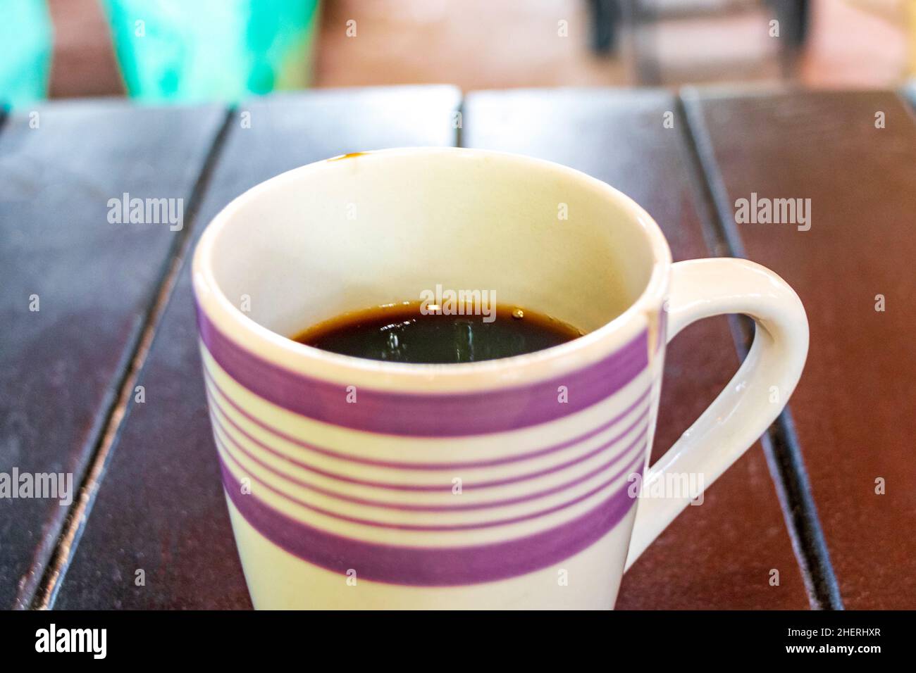 Mexican coffee on a brown wooden table in tropical nature resort on the ...