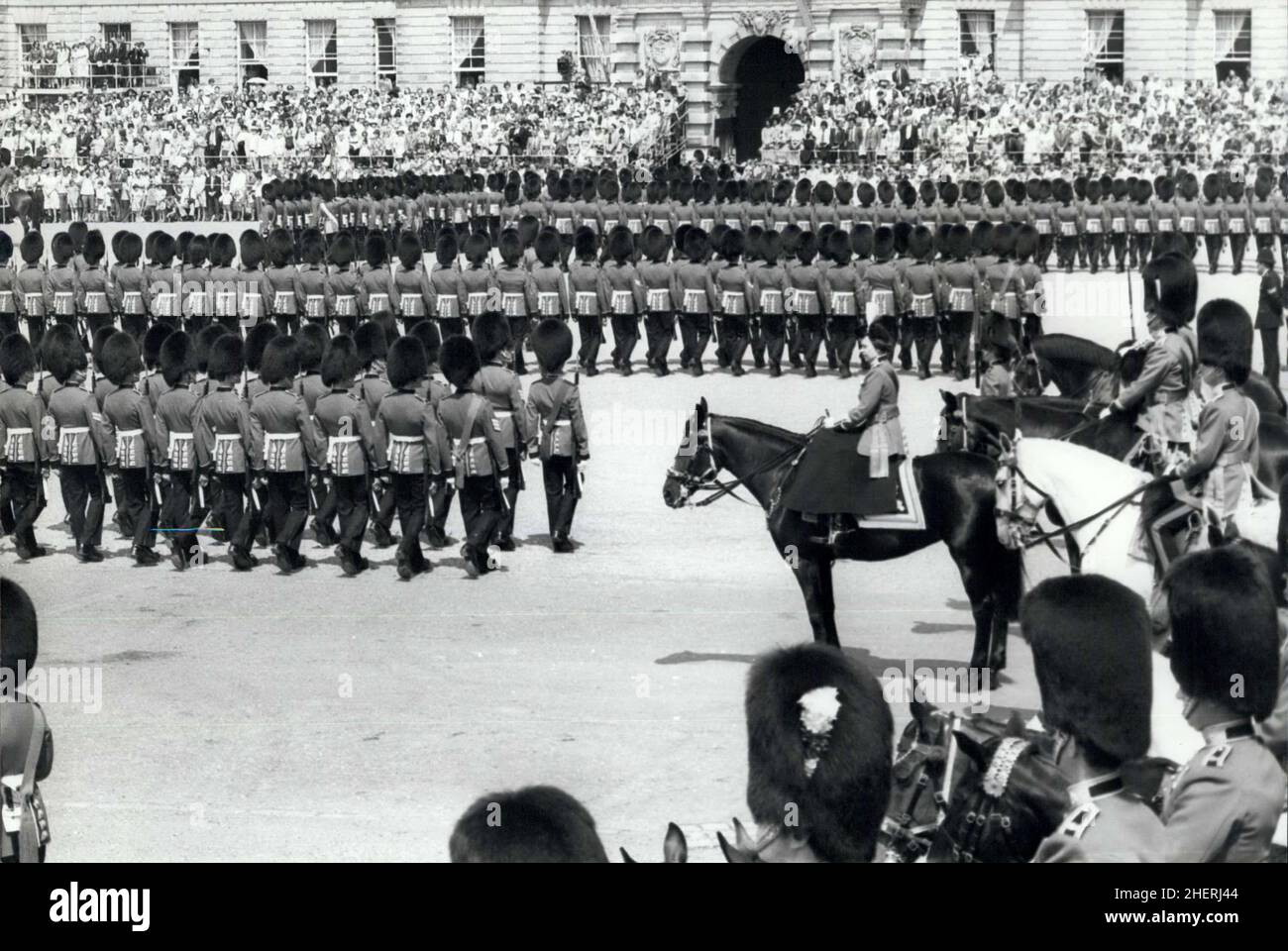 London, England, UK. 03rd June, 1978. The annual Trooping the Colour Ceremony took place today to mark the official birthday of Her Majesty on Horse Guards Parade. The Colour Trooped was that of the 2nd Battalion Grenadier Guards. H.M. QUEEN ELIZABETH II, right, on her horse 'Burmese' watches the march past during the Trooping the Colour Ceremony on Horse Guards Parade today. Credit: Keystone Press Agency/ZUMA Wire/Alamy Live News Stock Photo